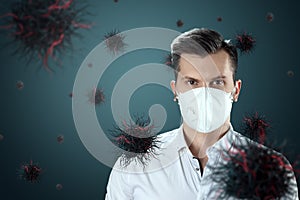 A man in a mask protects himself from virus particles flying in the air. Coronavirus, COVID-19, isolation, quarantine, pandemic