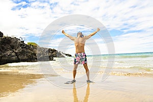 Man with mask for snorkling at the seaside beach