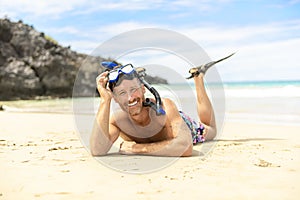 Man with mask for snorkling at the seaside beach