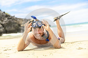 Man with mask for snorkling at the seaside beach