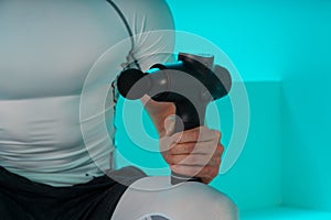 Man with massage percussion device