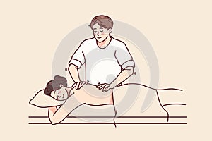 Man masseur massage female patient