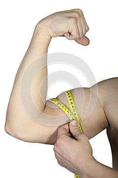 Man measuring his biceps