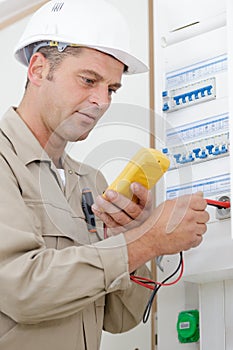Man measuring voltage