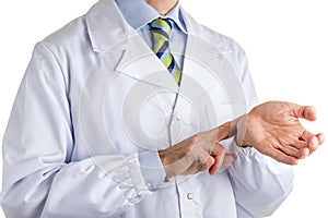 Man in medical coat feeling his pulse