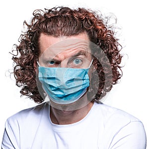 Man in medical mask. In fear of coronavirus 2019-ncov covid-19 concept.