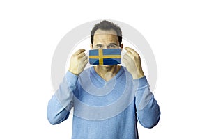 Man medical mask. Isolated. Coronavirus outbreak in Sweden. Covid-19 quarantine