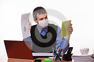 A man in a medical mask shows a paper document with graphs to a virtual interlocutor photo