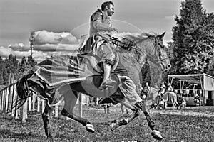 Man in a medieval historical clothes on horseback