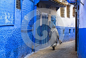 A man in Medina of Chefchaouen in Morocco