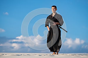 Man meditating before martial arts training