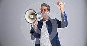 Man, megaphone and announcement, smile and call, join us and come on a grey background. Portrait, speech and person on