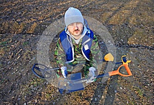 Man with metal detector .