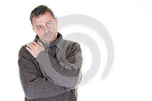 Man middle aged harms crossed on white background handsome guy aside copy space