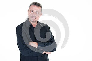 Man middle aged standing on white background handsome guy in black shirt