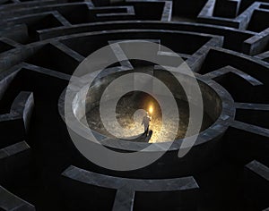 Man in the middle of a mysterious maze photo