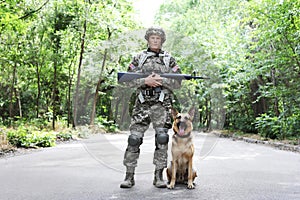 Man in military uniform with German shepherd dog