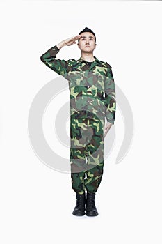 Man in military uniform saluting