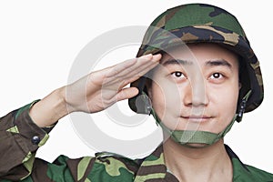 Man in military uniform saluting