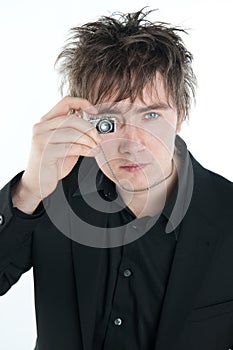 Man with miniature camera