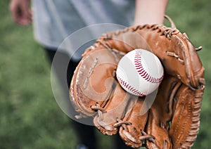 Man with a mitt and a ball