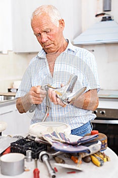 Man with mixer tap