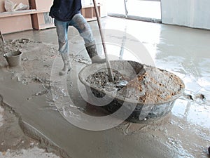 Man Mixing Cement