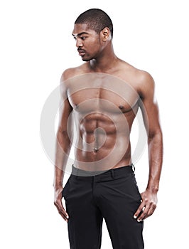 Man, model and shirtless for fitness, six pack and standing on white background, confident and abs. Studio backdrop, fit