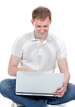 Man with modern laptop and typing on keyboard