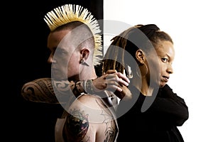 Man with Mohawk and Woman with Dreadlocks