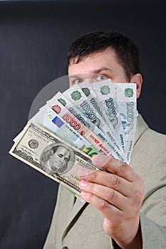 Man with money for a black background