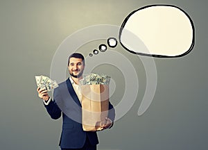 Man with money and speech bubble