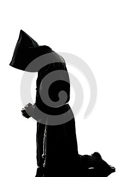 Man monk priest silhouette praying