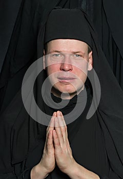 Man in a monk robe.