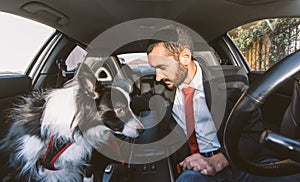 Man motivate his dog before canine competition