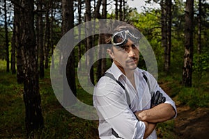 Man with motorcycle goggles and gloves