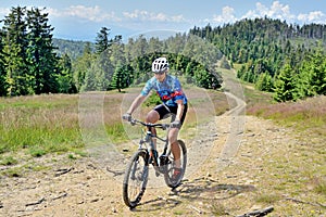 A man on a mountain bike.