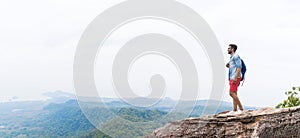 Man On Mountain Peak Raising Hands With Backpacks Enjoy Landscape Freedom Concept, Young Guy Tourist