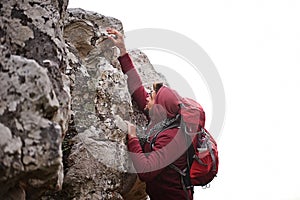 Man, mountain and rock climbing in nature for fitness, wellness and exercise for training and adventure in environment