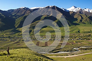 Man and mountain village