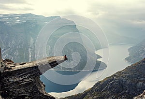 Man in mountains, Trolltunga , Norway