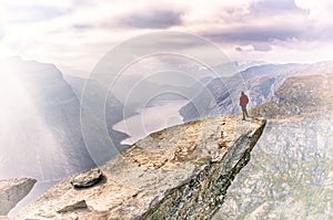 Man in mountains, Trolltunga , Norway