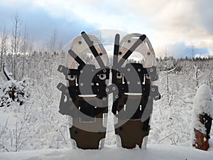 Man moves on snowshoes in the snow