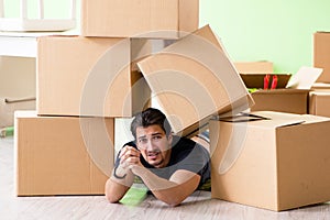 The man moving house with boxes