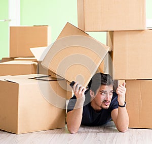 Man moving house with boxes