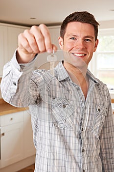 Man Moving Into New Home Holding Bunch Of Keys