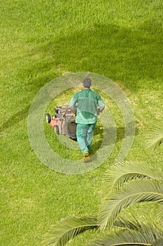 Man mowing grass