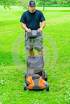 Man Mowing Grass