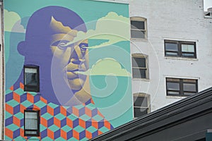 Man Mural and building windows in Portland, Oregon