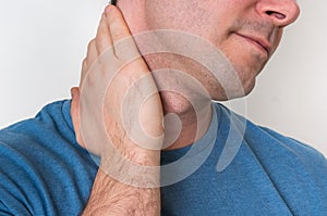 Man with muscle injury having pain in his neck